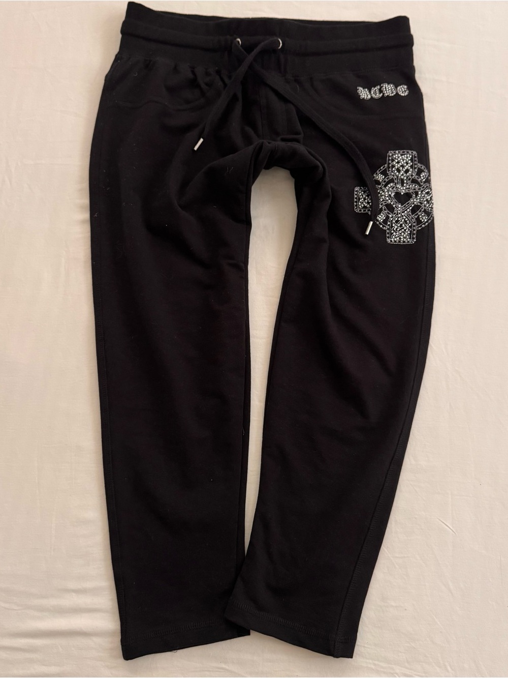 BCBGMaxAzria Black capris  with Rhinestone Cross Detail